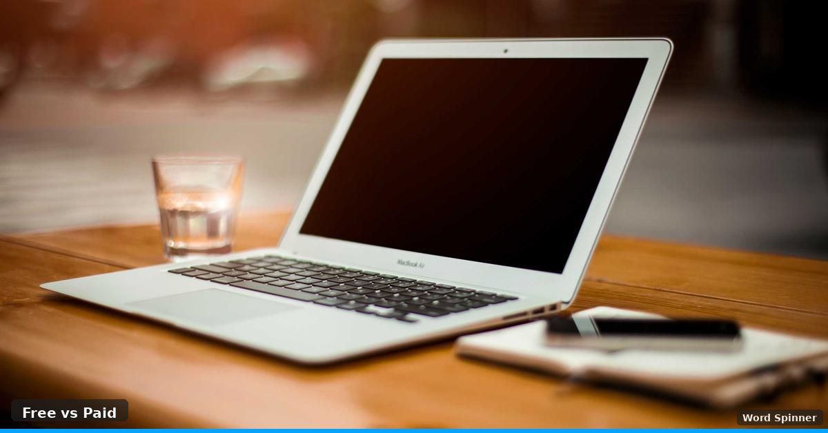 Laptop and notebook on clean wooden desk for content writing comparison