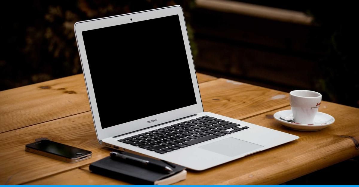 Laptop on clean desk representing ChatGPT paraphrasing for blog content