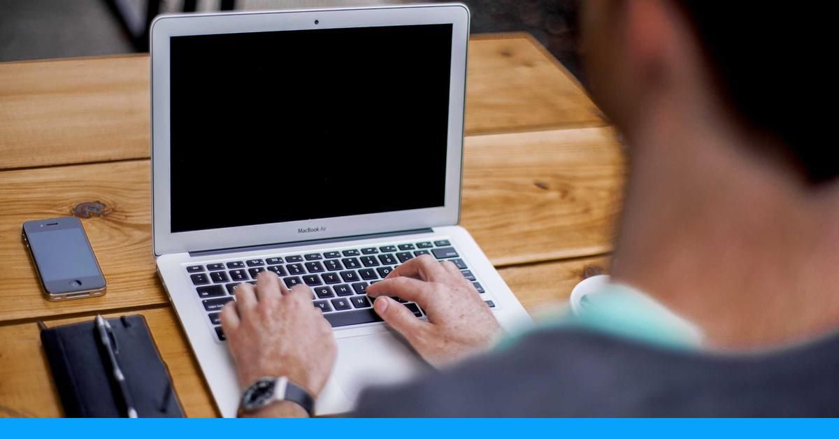 Student learning how to not get caught using ChatGPT while studying at laptop in university library